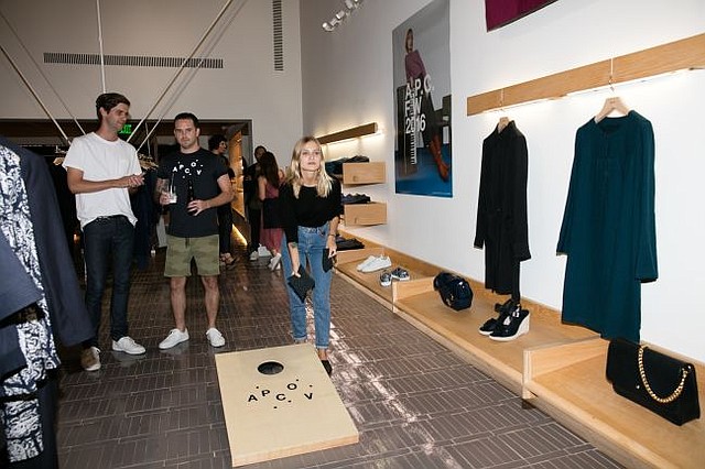 Party goer flexes her cornhole skills at A.P.C.'s Aug 31 party. It was held at the brand's Melrose Place shop. All photos courtesy of A.P.C.