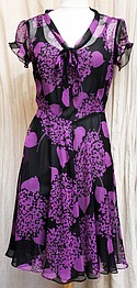 Silk dresses from the designer, purple and black sheath dress $498
