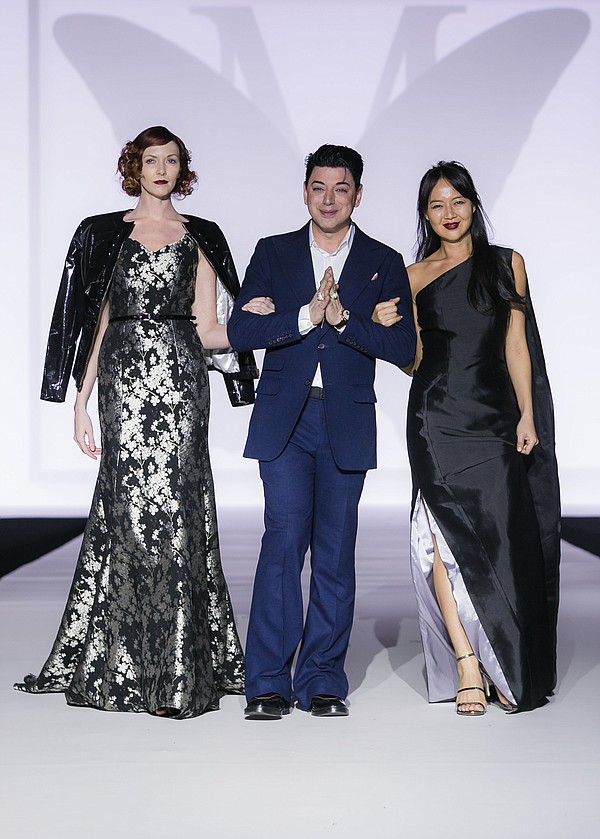 Malan Breton takes a bow with two models at Style Fashion Week show for his line “The 7 Deadly Sins.” All photos by Albert Evangelista.