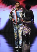 BEVERLY HILLS, CA - MARCH 16:  A model walks the runway wearing Burning Guitars Gear at Art Hearts Fashion LAFW Fall/Winter 2017 - Day 3 at The Beverly Hilton Hotel on March 16, 2017 in Beverly Hills, California.  (Photo by Arun Nevader/Getty Images)