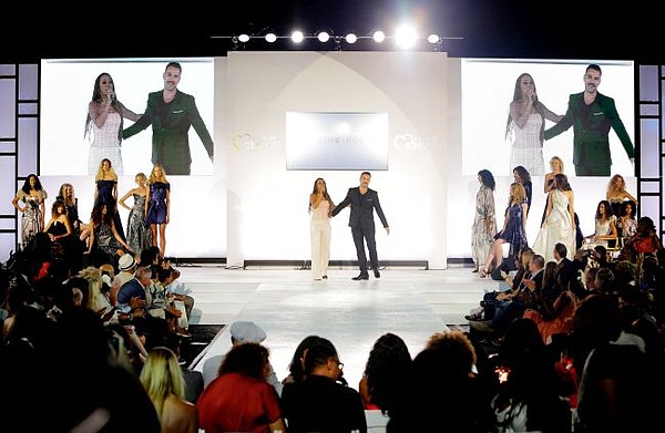 Host Holly Robinson Peete, left, and designer Rubin Singer onstage at HollyRod Foundation's DesignCare Gala. Photos by Tiffany Rose/Getty Images for HollyRod Foundation