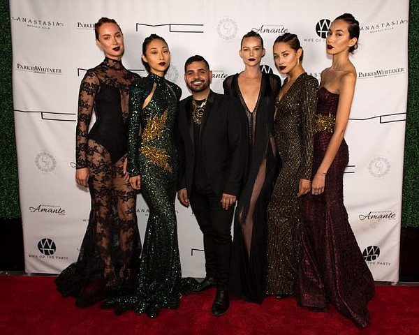 Michael Costello, center, with models wearing Michael Costello dresses, at debut party for his store. Picture by Michael Julius @michaeljulius.