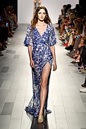NEW YORK, NY - SEPTEMBER 07:  A model walks the runway for Tadashi Shoji  fashion show during New York Fashion Week: The Shows at Gallery 1, Skylight Clarkson Sq on September 7, 2017 in New York City.  (Photo by Frazer Harrison/Getty Images For Tadashi Shoji)