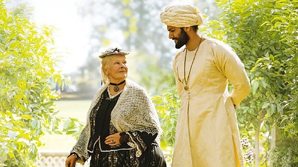 Judi Dench as Queen Victoria and Ali Fazal and Abdul Karim in “Victoria & Abdul”