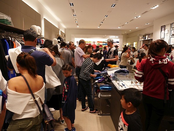 Black Friday crowds at the Lacoste boutique at South Coast Plaza in Costa Mesa, Calif.