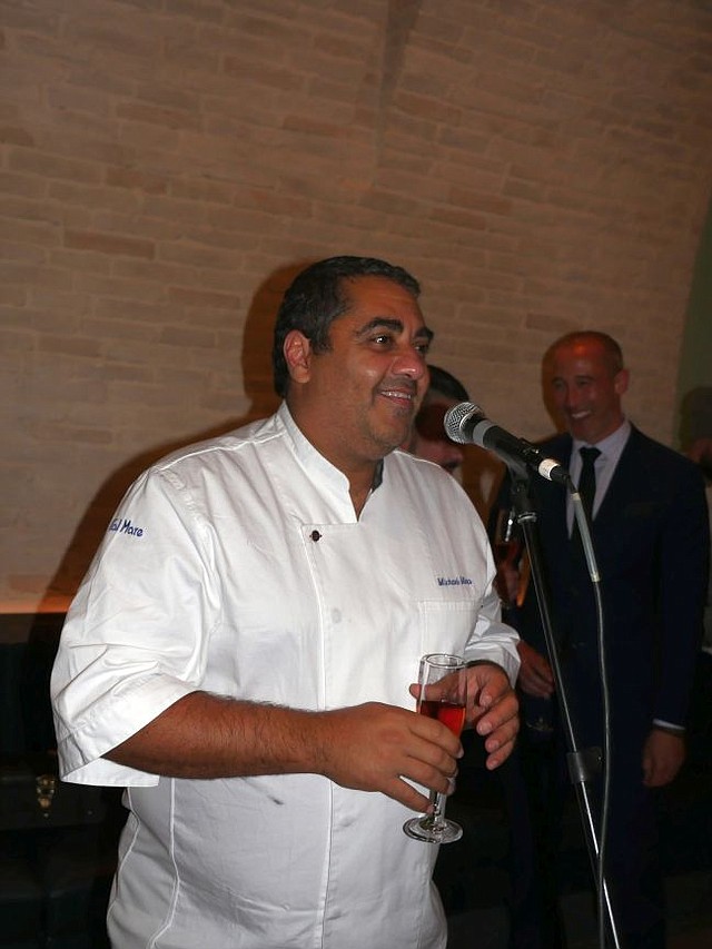 Chef Michael Mina makes a toast to Cal Mare on Nov. 30.