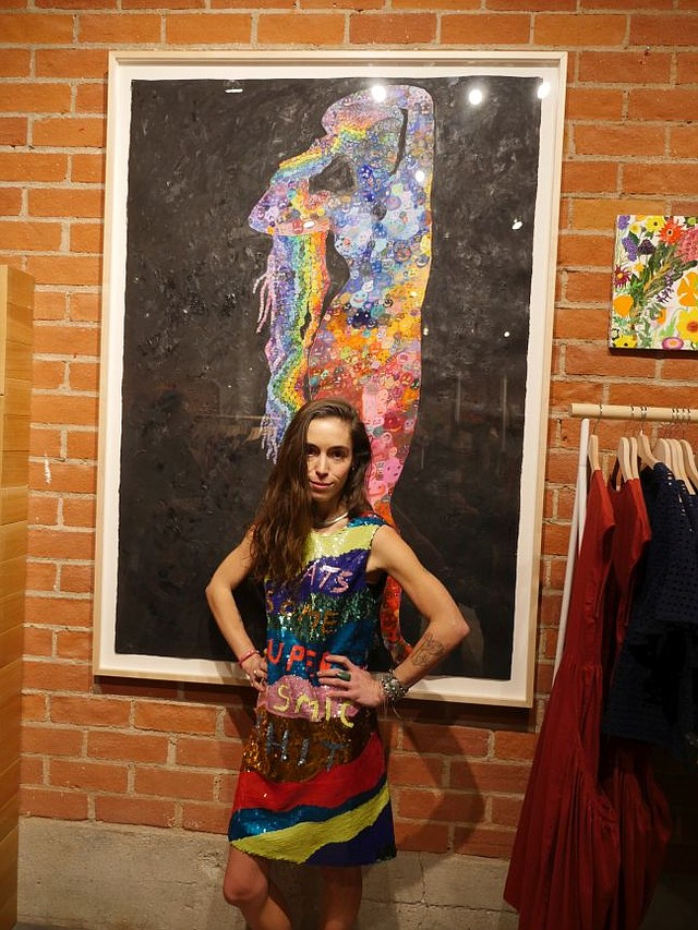 Lola Rose Thompson in front of one of her paintings at the Gorman boutique in West Hollywood.