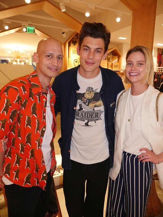 Daniel Hettmann, Band of Outsiders' brand director, left with Nick Lacy and Jessica Morrow, who are modeling the brand's clothes at the Band's Fred Segal pop-up.