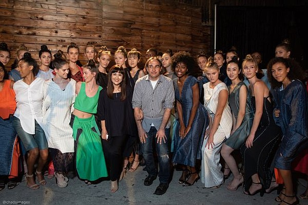 Vicken Derderian and Kyung Hwa Kim, center, take a bow after the Sept. 29 fashion show. All images by Chad Alan