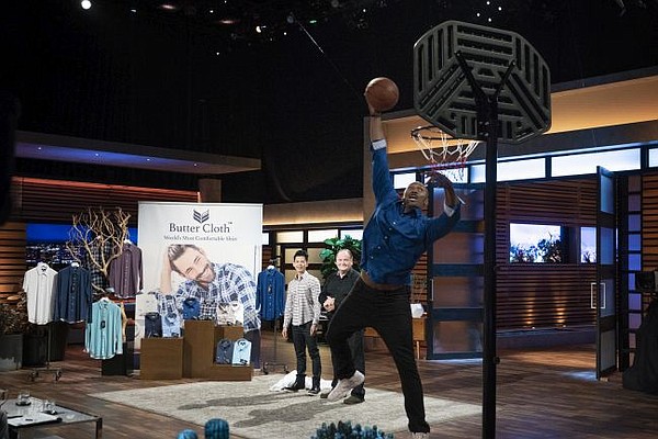 Metta World Peace dunks for Butter Cloth on Shark Tank. Image courtesy of Shark Tank