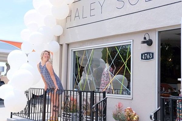 Haley Solar in front of her self-named shop. Photo by Will Dean.