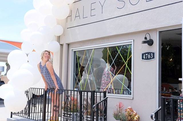 Haley Solar in front of her self-named shop. Photo by Will Dean.