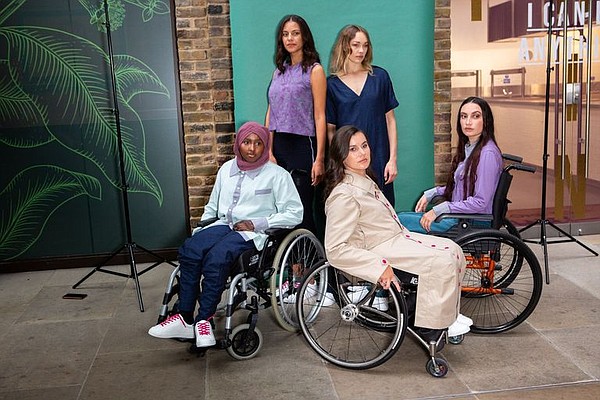 Models prepare to showcase the adaptive-fashion collection by Faduma's Fellowship and winner Harriet Eccleston during London Fashion Week. From left, in the back row, Alix Landais and Eleanor Davies. Front row from left, Najmah Samantar, Ella Beaumon and Lauren N.
Photo: Faduma's Fellowship