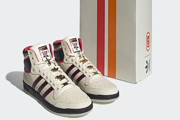 The The Adidas Top Ten Hi ESPN features ESPN's retro orange and red stripe detail is inspired by the original 1979 SportsCenter set. Photo: Adidas