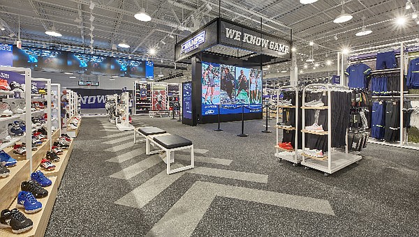 Champs Sports has unveiled the brand’s new retail concept, Champs Sports Homefield. The Homefield retail concept store features a full-sized basketball and multi-sport court in addition to a Champs Sports Combine VR system that measures customers’ wing spans, height, jumping ability and agility. Also featured will be a “try-on treadmill” where customers can try running shoes. Image: Champs Sports